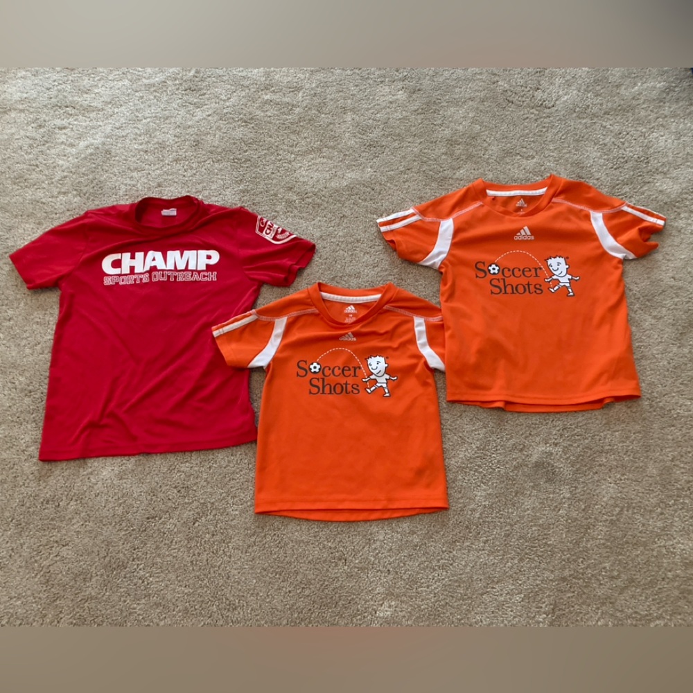 Champ and soccer shots shirts. Soccer shots are adidas and champ is sport-tek